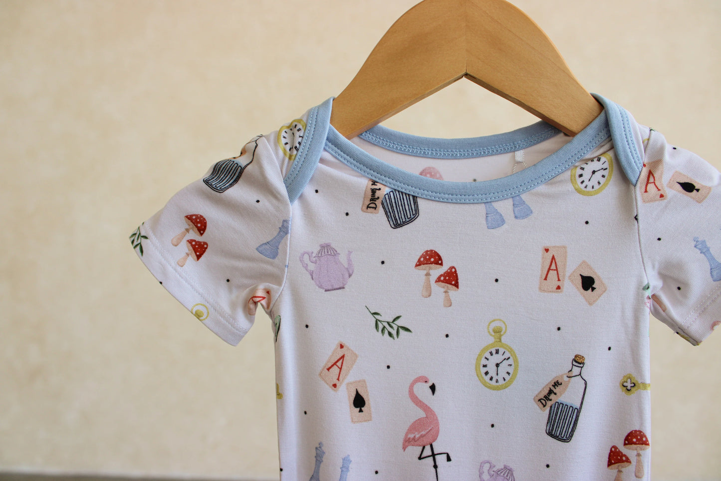 Curiouser Short Sleeve Bodysuit